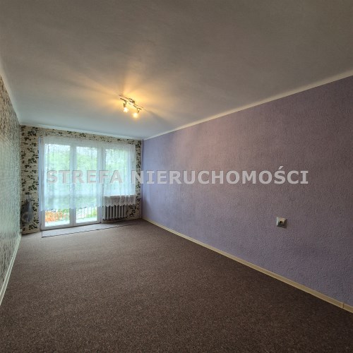 -pokój I z wyjściem na balkon