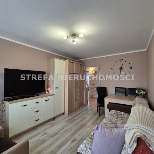 -pokój I z wyjściem na balkon